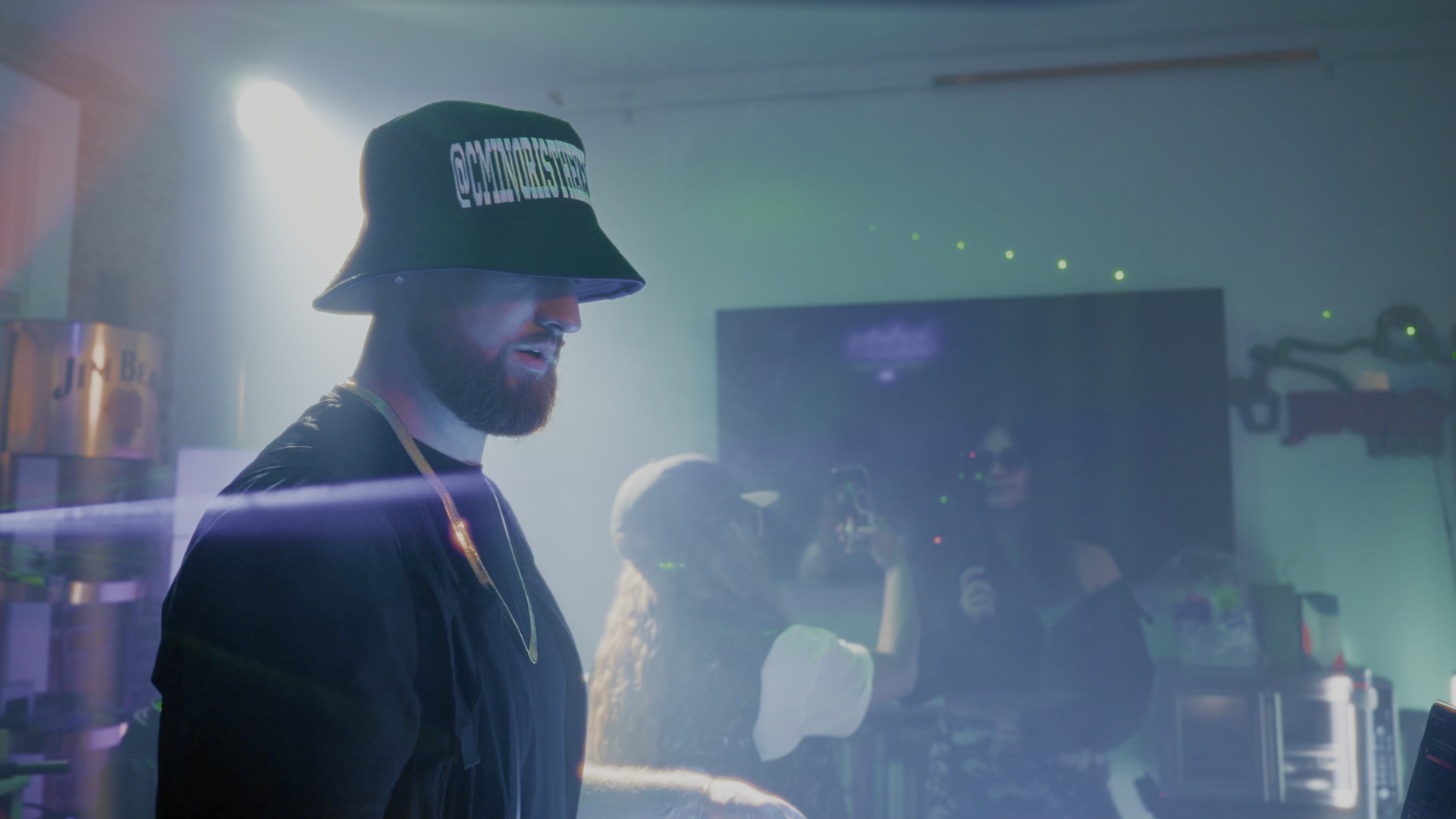 C Minor performing — cinematic portrait under stage haze